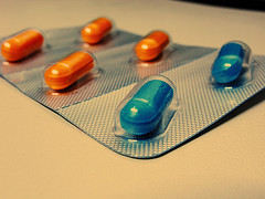 Pills, by Flickr user Jean, licensed by Creative Commons
